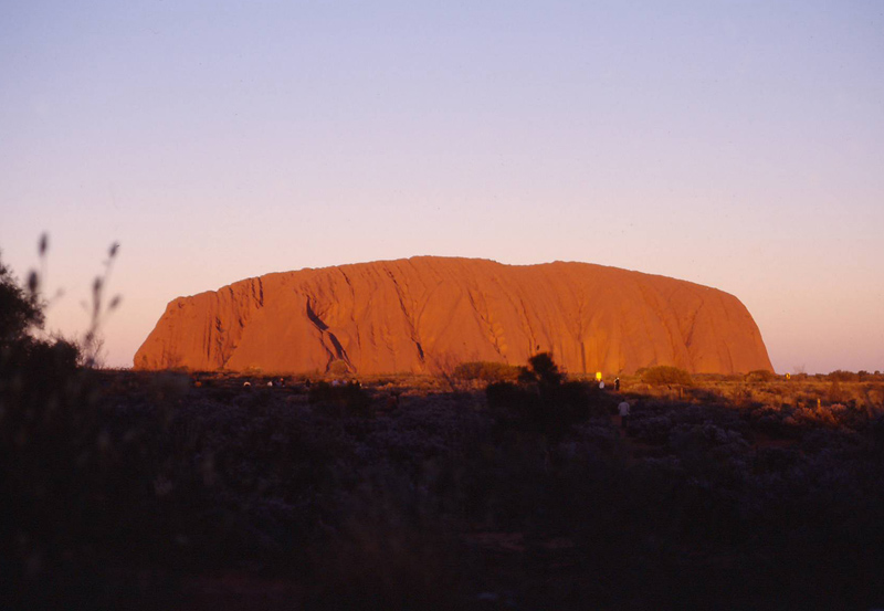 Uluru, or Ayer's Rock. This was taken at sunset when the rock is supposed to change colour. Needless to say, it doesn't.